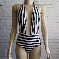 Nwot Retro Black And White Lowcut Lined Swimsuit In Large. Bottom Is High Elastic Waist With Full Coverage. Very Simple But Sexy Cute. Striped Stretch One-piece Bodysuit, Striped Bodysuit With Lined Body For Vacation, Chic Striped Fitted Bodysuit, Striped Lined Bodysuit For Vacation, Chic Fitted Striped Bodysuit, Chic Striped Swimwear With Lined Body, Chic Striped Lined Swimwear, Lined One-piece Beachwear Bodysuit, Striped Stretch Bodysuit For Summer