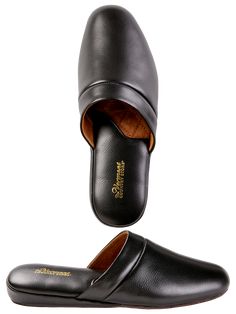 You won't give a second thought to your feet once you slip on our genuine all-leather scuffs. That's because they sport hand-turned leather uppers, which means all the seams are tucked invisibly inside for a classic look and ultra-comfortable fit. All that's missing is a velvet smoking jacket and ascot. We'll leave that up to you. Crafted in buttery soft leather No irritating seams Soft leather insoles Suede outsoles Width runs narrow Spot clean Imported Coordinating Genuine Leather Slippers (#31642), sold separately | Men's Genuine Leather Scuffs - Black - 10 - The Vermont Country Store Classic Leather Footbed Slip-on Slippers, Black Leather-lined Slip-ons With Round Toe, Classic Slippers With Leather Footbed And Round Toe, Black Leather Lined Slip-ons, Black Slip-ons With Leather Lining And Plain Toe, Black Plain Toe Slip-ons With Leather Lining, Classic Slippers With Removable Insole, Classic Slippers With Removable Insole And Round Toe, Classic Closed Toe Slippers With Leather Footbed