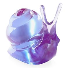 A mesmerizing must-have in solid purple acrylic, our extra giant snail looks fab anchoring a tablescape or makes a great focal point in an unused fireplace. The oversized acrylic sculptures start their journey in the Soho pottery studio, where Jonathan and his team hand-sculpt each model. Each piece is then cast in acrylic and polished to perfection. 20"W x 32.5"D x 35"H 100% Purple Acrylic Imported Shop more Jonathan Adler Unused Fireplace, Giant Snail, Handmade Wallpaper, Acrylic Sculpture, 2 House, Purple Acrylic, Jonathan Adler, Year 2, Ceramic Vases