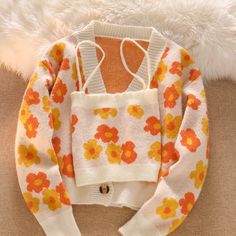 SPECIFICATIONSYarn Thickness: Regular yarnThickness: Thick （Winter)Style: SweetSleeve Style: RegularSleeve Length(cm): FullSeason: Spring/AutumnPercentage of Material: 31%-50%Pattern Type: FloralPattern: A-straightOrigin: CN(Origin)Model Number: 064Material Composition: cottonMaterial: Polyester,CottonGender: WOMENDecoration: FlockingCollar: V-NeckClothing Length: ShortClosure Type: Single BreastedBrand Name: FTLZZAge: Ages 18-35 Years Old Flower Cardigan, Slim Blouse, Cardigan Knitted, Bandeau Tops, Camisole Set, Vest Set, Cardigan Crop Top, Y2k Era, Cardigan Crop