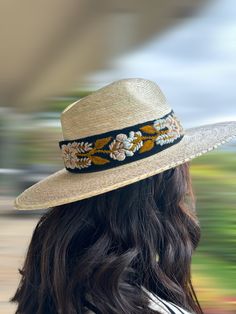 Our Mexican, high quality Artisal Palm Hat, comes with a removable hand embroidered band. The band is embroidered by Female Artisans of the Andes in Perú. This classic wide brim hat has sturdy weave to be used in the beach and all adventures in the sun. Great sun protection. The close-weave material in this product offers UPF 50+ which blocks 97.50% of the sun's UV rays.One size Hat Brim measures 3 3/4" wide Crown of hat measures 4 1/2" tall Three options for bands available: Spring Flowers, Min Handwoven Wide Brim Panama Hat In Palm Leaf, Summer Embroidered Wide Brim Hat, Handwoven Palm Leaf Flat Brim Hat, Bohemian Straw Hat With Curved Brim, Woven, Western-style Handwoven Wide Brim Sun Hat, Wide Brim Hat Summer, Summer Straw Hat, Wide Brimmed Hats, Fedora Hat