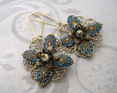 Etsy :: Your place to buy and sell all things handmade Vintage Turquoise Flower Earrings, Vintage Turquoise Dangle Flower Earrings, Nickel-free Blue Flower Earrings For Wedding, Vintage Blue Handmade Flower Earrings, Handmade Blue Ornate Earrings, Ornate Handmade Blue Earrings, Blue Ornate Handmade Earrings, Turquoise Filigree Earrings For Gift, Turquoise Filigree Earrings As Gift