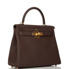 This Kelly, in the Retourne style, is in Chocolate togo leather with gold hardware and has tonal stitching, front flap, two straps with center toggle closure, clochette with lock and two keys, single rolled handle and removable shoulder strap.The interior is lined in Chocolate chevre and has one zip pocket with Hermes engraved pull and two open pockets on the opposite side.Collection: YOrigin: FranceCondition: New (plastic on hardware)Accompanied by: Hermes box, Hermes dustbag, clochette, lock, Hermes Kelly Retourne, Kelly Retourne, Hermes Box, Togo Leather, Hermes Shoes, Fendi Shoes, Louis Vuitton Shoes, Dior Shoes, Leather Briefcase