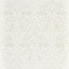 a white wallpaper with an intricate design