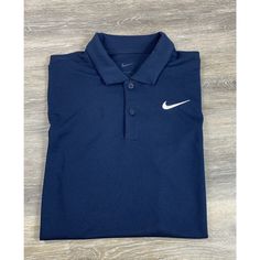 Elevate Your Style With This Sleek Nike Navy Blue Polo Shirt Designed For Men. Crafted With Dri-Fit Technology, This Shirt Ensures You Stay Cool And Dry When You're On The Move. This Short-Sleeved Polo Shirt Features The Iconic Swoosh Emblem, Making It A Stylish Choice For Any Occasion. The Shirt Is Available In An Xs Size And Is Perfect For Those Who Prefer A Regular Fit. Whether You're Dressing Up For A Casual Day Out Or Hitting The Golf Course, This Polo Shirt Is An Excellent Addition To Your Wardrobe. New Without Tags 100% Polyester Fz5646-451 Retail $55 8/4496 Navy Blue Polo Shirt, Shirt Designs For Men, Red Polo Shirt, Polo Shirt Design, Blue Polo Shirt, Resort Shirt, Blue Polo Shirts, Blue Camo, Blue Polo