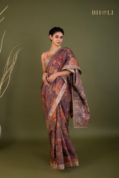 This exquisite handloom tussar silk saree features intricate gota and pearl work, handcrafted with precision and care. The digitally printed design adds a modern touch to this traditional piece, while the soft and flowy fabric ensures comfort and elegance. The perfect choice for those seeking a smart and contemporary saree. Contemporary Saree, Pearl Work, Flowy Fabric, Tussar Silk Saree, Beautiful Saree, Unique Charms, Blouse Piece, Printed Design, Silk Saree