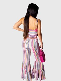 DescriptionMaterial: Polyester and spandex. Very stretchy and comfy to wear.Features: Spaghetti straps. multicolored rainbow stripe overalls. floor-length. flared flowy pants. high waisted.Details: This Striped Wide Leg Bell Bottom jumpsuit shows your charming figures. Trendy to wear.Occasions: Cute Jumpsuits for a party. club. night out. beach. travel. vacation. outgoing. homecoming. and daily wear.Size Chart: Cute Jumpsuits, Bell Bottom Jumpsuits, Striped Flare Pants, Summer Jumpsuits, Cheap Jumpsuits, One Piece Jumper, Trouser Outfit, Pants High Waisted, Flare Jumpsuit