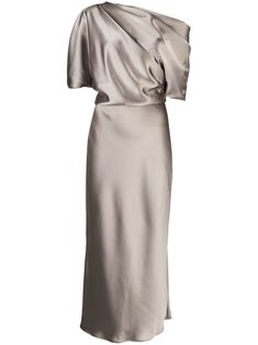 a white dress on a mannequin dummy with one shoulder draped over the top