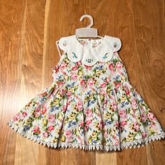 Toddler Dress From China Floral Cotton With Lace Trim And Embroidered Collar Zip Back With Bow Fitted Floral Embroidery Dress With Doll Collar, Spring Embroidered Dress With Doll Collar, Casual Sleeveless Dress With Floral Applique, Summer Embroidered Dress With Doll Collar, Fitted Cotton Dresses With Floral Applique, Red Cotton Dresses With Doll Collar, White Doll Collar Dress With Floral Embroidery, Red Cotton Dress With Doll Collar, White Floral Embroidery Dress With Doll Collar