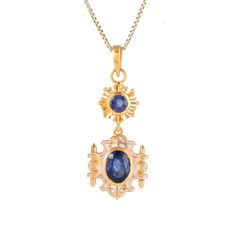 Blue Sapphire 14K Gold Vermeil Over Sterling Silver Art Deco Enameled Pendant 925 Silver = 3.95 gm. Blue Sapphire=2.40 ct. Blue Sapphire is the birthstone for September and is a symbol of heaven. The beautiful Pendant measures to be 1.50 inches long including bale and 0.65 inches wide at its maximum points. The Pendant have been made by a team of highly trained and skilled artisans. 14K Gold Vermeil Over 925 Sterling Silver Chain can be provided at additional cost of US $ 25.00 What is Vermeil 1 Yellow Gold Enamel Oval Pendant Jewelry, Celestial Hallmarked Jewelry With Oval Stones, Celestial Style Hallmarked Oval Jewelry, Yellow Gold Enamel Oval Jewelry, Oval Yellow Gold Enamel Jewelry, Gold Enamel Necklace With Cabochon, Gold Enamel Necklaces With Cabochon, Enamel Gemstone Jewelry For Anniversary, Sapphire Jewelry Stamped 14k For Gift