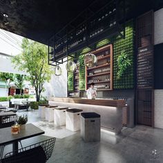 the interior of a restaurant with tables, chairs and shelves filled with bottles on them