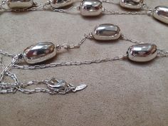 Vintage AVON jewelry collection Gorgeous silver oval beaded pendant chain necklace Well used Ready to ship! Silver Necklaces With Polished Beads, Silver Elegant Chain Necklace With Polished Beads, Oval Silver Chain Metal Necklace, Oval Silver Chain Necklace, Silver Jewelry With Beaded Chain And Oval Beads, Silver Oval Chain Necklace, Silver Oval Metal Necklace, Silver Jewelry With Oval Silver Beads, Nickel-free Oval Silver Necklace