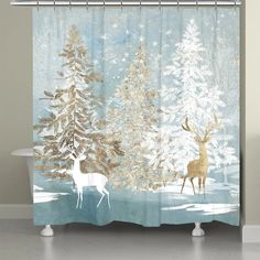 a shower curtain with a deer and trees in the snow on it's side