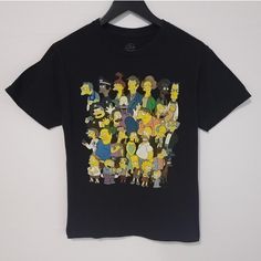 Vtg Simpsons Characters T-Shirt The Simpsons Men's Size Small Characters Vtg Graphic Print T-Shirt In Perfect Condition Measurements Pit: 18/46cm Length: 26/66cm Condition: 10/10 Size S Machine Washed 100% Cotton #Cartoon #Thesimpsons #Simpsons #Adultswim #Cartoontees Retro Black T-shirt With Cartoon Print, 90s Style Black T-shirt With Vintage Print, Black 90s Vintage Print T-shirt, Retro Yellow T-shirt For Fan Merchandise, Vintage Black T-shirt With Cartoon Print, Yellow Pop Culture T-shirt With Character Print, Black Vintage Print Short Sleeve Top, Yellow Pop Culture Character Print T-shirt, Vintage Yellow Crew Neck Shirt