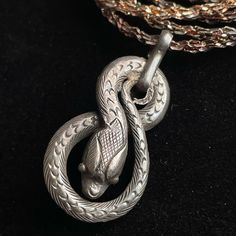 Very Old 1940’s Sterling Silver Snake Pendant With Hook And Ribbon Loop Option To Wear As A Choker. As Shown On Mannequin. Vintage Sterling Silver Milor Italy Silver Cable Chain. Sterling Silver Snake Pendant Tested Positive For Sterling. No Hallmarks. Paired With A Sterling Silver Cable Herring Type Chain With Lobster Clasp. Chain Has 925 Sterling Hallmarks And Italy Lots Of Patina And Wear From Age And Use. Very Old See Photos For Condition. I Have A Matching Ring Listed In My Closet ***** Not Serpent Snake, Snake Pendant, Snake Jewelry, Matching Ring, Snake Necklace, Matching Rings, Cable Chain, Necklace Pendant, Charm Jewelry