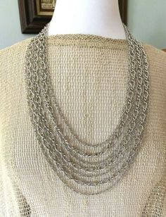 Crown Trifari Vintage Multi 7 Strand Silver Chain Statement Necklace Mid Century | eBay Vintage Long Silver Chain Necklace, Multi-strand Metal Jewelry With Chain Strap, Multi-strand Metal Chain Strap Jewelry, Metal Multi-strand Jewelry With Chain Strap, Metal Multi-strand Chain Strap Jewelry, Vintage Double Chain Multi-strand Necklace, Vintage Multi-strand Double Chain Necklace, Vintage Silver Chain Link Necklace, Vintage Double Chain Metal Necklace