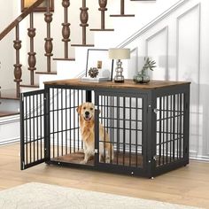 a dog in a cage next to some stairs and a table with a lamp on it