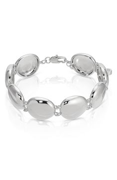 This pebble-inspired bracelet features a high-polish finish that catches light with your every gesture. 7" length; 2" extender Lobster clasp closure 18k-gold plate or rhodium plate Imported Polished Sterling Silver Bracelet For Formal Occasions, Modern White Gold Diamond Bracelet With Polished Finish, Modern White Gold Polished Diamond Bracelet, Oval White Gold Jewelry With Shiny Finish, White Gold Oval Metal Jewelry, Oval White Gold Metal Jewelry, White Gold Bracelets With Oval Links And Oyster Design, White Gold Metal Bracelets With Shiny Finish, Modern Adjustable Jewelry With Shiny Finish