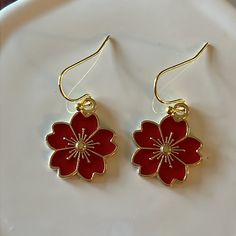 Red Flower Earrings Made With Enamel And Gold Earwire. *Approx 3/4” Flower *Gold Plated Earwire Flower Shaped Earrings For Valentine's Day, Flower-shaped Earrings For Valentine's Day, Red Flower Charm Earrings, Red Round Flower Earrings With Ear Wire, Red Dangle Flower Earrings For Valentine's Day, Red Flower Earrings For Valentine's Day, Red Drop Earrings With Flower Charm, Red Earrings With Flower Charm For Gift, Red Flower Drop Earrings