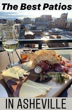 the best patios in nashville, tennessee with wine and cheese on a wooden table