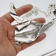 Unique Hand Cast Silver Necklace, Silver Hand Forged Metal Necklace, Hand Forged Silver Metal Necklace, Unique Hand Cast Metal Necklaces, Unique Metal Chain Necklace As Gift, Hand Cast Metal Brutalist Jewelry, Hand Cast Brutalist Metal Jewelry, Brutalist Hand Cast Metal Jewelry, Hand Forged Silver Metal Chain Necklace