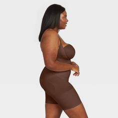 Talk about three for one! This open-bust bodysuit uses breathable, comfortable compression to tone the tummy and hips, and give you a perky rear view. Best of all? The full-coverage design is made from soft, cling-free fabric for additional comfort and is also seamless for invisible layering under your clothes. Fitted Seamless Brown Bodysuit, Seamless Brown Shapewear, Fitted Seamless Brown Shapewear, Full Coverage Compression Shapewear, Bra Friendly, Bra-friendly Compression Full Coverage Shapewear, Compressive Bra-friendly Shapewear, Bra Friendly Sculpting Shapewear, Body Slimmer, Open Bust