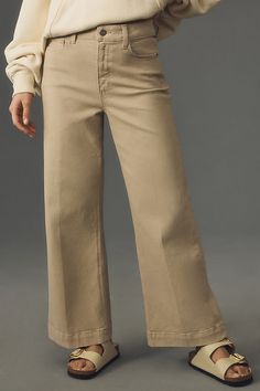 98% cotton, 2% elastane Five-pocket styling Front zip Machine wash Imported | The Anessa High-Rise Crop Wide-Leg Jeans by PAIGE in Beige, Women's, Size: 24, Cotton/Elastane at Anthropologie Beige Cropped Cotton Pants, Beige Cotton Cropped Pants, Neutral Wide Leg Cotton Jeans, Neutral Cotton Wide Leg Jeans, Mid-rise Cotton Bottoms For Work, Chic Khaki Cotton Bottoms, Chic Cotton Bottoms With Side Pockets, Beige Cotton Jeans With Hip Pockets, Beige Workwear Jeans With Pockets