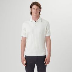 Short-sleeved solid vertical stripe stitch knit polo in cotton blend with three button placket and contrast tipped collar and armbands. Classic Collared Polo Sweater With Contrast Stripes, Classic Short Sleeve Polo Sweater With Striped Collar, Classic Striped Polo Sweater With Ribbed Collar, Classic Striped Polo Sweater With Polo Collar, Classic Ribbed Cotton Polo Shirt, Classic Ribbed Polo Shirt With Polo Collar, Knit Polo, Polo Sweater, Polo Collar