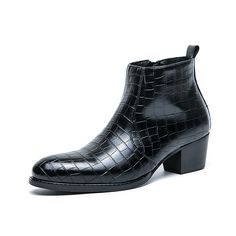 a black ankle high boot with an alligator skin pattern