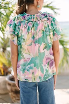 Breathe life into your workday wardrobe with this blouse, boasting a delicate watercolor floral print and elegant ruffled details. It's a perfect blend of professional chic and feminine charm, making it a must-have for those important office meetings or after-work outings. The watercolor print adds a splash of creativity to your outfit, while the ruffled details lend a playful touch. V-neckline Ruffled detailing Short layered sleeves Watercolor floral print No stretch Sydney is wearing the small Feminine Printed Ruffle Sleeve Blouse, Elegant Ruffle Sleeve Floral Print Blouse, Printed Blouse For Garden Party, Elegant Ruffle Sleeve Blouse With Floral Print, Elegant Blouse With Floral Print And Ruffle Sleeves, Floral Print Ruffle Sleeve Blouse For Vacation, Chic Floral Print Blouse For Garden Party, Feminine Multicolor Floral Print Blouse, Feminine Floral Print Top With Ruffle Sleeves