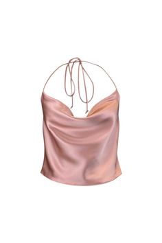 The Odette Silk Satin Draped Backless Top in French is luxuriously draped on the bias from our signature silk charmeuse. This color can be described as a dynamic pink/beige/sand hue. Pair it with your favorite trousers for an elevated night out look, or dress it down with your favorite pair of jeans. Scroll through to see the 4 different ways you can tie the straps to change up the look from delicately tied at the shoulders to almost fully backless when tied under the arms. CARE & INFO Dry clean only 100% silk Fully lined in silk Bias cut SIZING NOTES True to size, take your usual size. Krysta is wearing size XS. She is 5’9” (180 cm) If you have any questions, please reach out to info@jacobajane.com. Sew Silk Top, Silk Backless Top, Satin Backless Top, Silk Two Piece Outfit, Backless Top Outfit, Satin Top Outfit, Rich Closet, Skirt Ideas, Silk Clothes