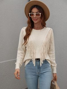 Our forest adventures knit top is a milky cream tone in a lovely relaxed fit. This snug knit is sure to keep you warm as it features a classic crew neckline and front tassel details. Pair with jeans for a lazy day outfit or complete the look with our Smaibulun Ugg. Size Guide: Ambre is 5’2” tall, and has a 33.2” bust, 24.5”waist, & 36.7” hips. She is wearing a S / US 4 / AU 8. This jumper is true to size. Feature: Relaxed fit. Crew neckline. Front tassel details. Material: 100% Acrylic. Care Ins Western Sweaters, Fringe Sweater, Legging Sport, Classic Sweater, Knit Sweaters, Detailed Sweater, Loose Outfit, Weekend Outfit, Cute Sweaters