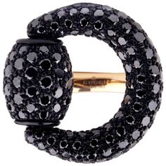 An iconic Gucci ring featuring a Horsebit motif set with a plethora of black round brilliant cut diamonds (3.98ct) in 18k rose gold. Size 6.75, Ring Width: .87" Sku: 661 Rose Gold Black Diamond Ring, Gucci Ring, Sapphire Cocktail Ring, Black Diamond Jewelry, Gucci Horsebit, Gold Cocktail Ring, Gold And Silver Rings, Black Diamond Ring, Diamond Cocktail Rings