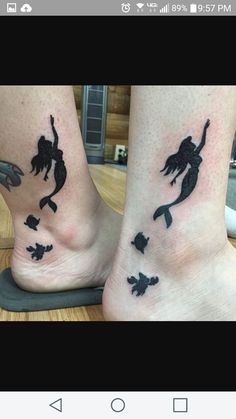 two people with matching tattoos on their feet, one has a fish and the other is a mermaid