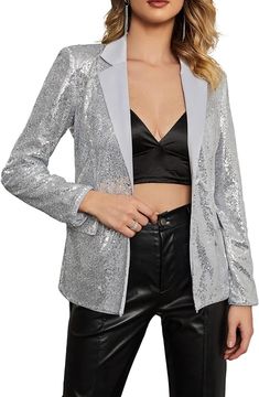 This Shiny Sequins Long Sleeve Blazer Jacket is a stylish piece of outerwear. It features an eye-catching array of shiny sequins and a long-sleeve design to keep you warm. The tailored fit ensures a flattering, comfortable wear. 100% Polyester Imported Polyester lining Button closure Hand Wash Only Brand Size Dress Bust Waist Hip XS 0-2 31-32.5'' 23-24'' 31-34" S 4--6 33-35'' 25-26'' 35-37" M 8--10 35-36'' 27-28'' 38-39" L 12--14 38-40'' 29-31'' 40-42" XL 14-16 40-42'' 33.5-36'' 44-46" 2XL 18-20 Trendy Outerwear With Contrast Sequin For Party, Metallic Winter Party Outerwear, Glitter Outerwear For Party Season, Metallic Sequin Party Outerwear, Metallic Outerwear For Winter Party, Metallic Sequined Party Outerwear, Metallic Outerwear For Party In Winter, Metallic Sequined Outerwear For Party, Winter Glitter Long Sleeve Outerwear