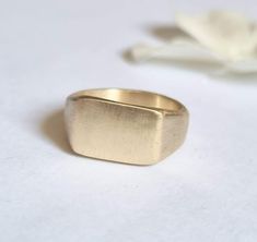 Gold signet ring, signet ring women, gold pinky ring, pinky ring women, rectangle signet ring This gold signet ring is just the perfect, classic pinky ring for women. The gold pinky ring is rectangle and minimalist and simply right for your finger. The signet ring was handmade from start to finish by carving in wax, and later casted in different metals. The pinky ring is available both in 14k, nickel free, gold plating over brass or sterling silver base. I also offer this ring in 9k and 14k soli Signet Rings Women Gold, Pinky Ring For Women, Rectangle Signet Ring, Signet Pinky Ring, Pinky Rings For Women, Signet Ring Women, Signet Rings Women, Gold Pinky Ring, September Birthstone Rings