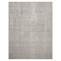 a gray rug on a white background with no one in the room to see it