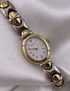 Bulova Ladies Two Tone Dainty Oval Slim Chic Quartz Watch Elegant   | eBay