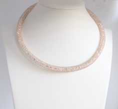 This necklace is made of gold and has a sparkle. It's a loop design that looks great on any woman. Loop Design, Sparkle Necklace, Rose Gold Necklace, Tennis Bracelet, Christmas Sale, Rainbow Colors, Looks Great, Diamond Necklace, Pearl Necklace