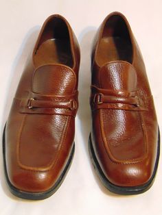 The Worthmore Shoe by Florsheim Men's Shoes * Oxford/Loafer Style * Made in USA * Vintage 50's/60's * 1 3/8" Height Heel Colors: Brown Material: Leather Upper, Balance Man Made Size- Men's 9 E (wide) Retro Almond Toe Oxfords For Workwear, Retro Oxfords With Brogue Detailing For Work, Retro Brogue Oxfords For Work, Retro Oxfords With Rubber Sole For Work, Retro Leather Sole Loafers For Work, Retro Leather Loafers For Work, Vintage Brown Monk Strap Shoes With Brogue Detailing, Retro Oxfords With Brogue Detailing, Retro Oxfords With Leather Sole For Work