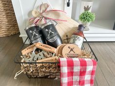 a basket filled with wine bottles and other items