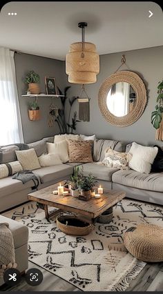 a living room filled with lots of furniture and decor on top of a white rug