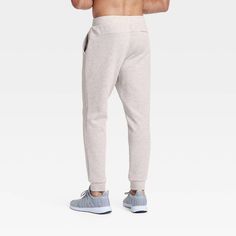 Why we're ALL IN: Mesh spacer joggers with a solid-color finish, double-knit texture, mid rise, full length and banded cuffs. Crafted from a lightweight fabric blend with stretch for comfortable wear that moves with you. Tailored in a regular-fit silhouette. Feature side pockets and a zippered back pocket for stashing go-to essentials, and a drawstring waistband for a customizable fit. All in Motion™: Inspiring the potential in every body. Fitted Sweatpants With Ribbed Cuffs, Athletic Fit Sweatpants With Comfort Waistband, Athletic Fit Sportswear Sweatpants With Comfort Waistband, Fitted Joggers With Elastic Waistband, Fitted Functional Joggers With Elastic Waistband, Tapered Leg Sweatpants With Elastic Waistband For Gym, Gym Sweatpants With Ribbed Waistband, Tapered Leg Joggers With Comfort Waistband For Gym, Fitted Joggers For Gym