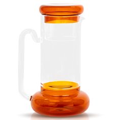 an orange glass pitcher with a yellow lid