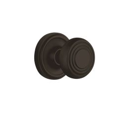 an antique style door knob with a round design on the front and side, in oil rubbed bronze