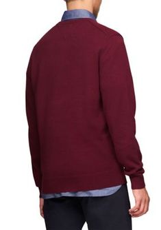 Amp up your style with this sweater from Tommy Hilfiger. Wear it on its own for a casual look or layer it over a collared shirt for a more elevated look. | Tommy Hilfiger Men's Essential V-Neck Sweater, X-Large Business Casual Top With Ribbed Cuffs For Fall, Fall Business Casual Top With Ribbed Cuffs, Casual Tommy Hilfiger Tops With Ribbed Collar, Polo Sweater For Layering In Fall, Casual Tommy Hilfiger Top With Ribbed Collar, Casual V-neck Sweater For Business Casual, Tommy Hilfiger Sweater With Ribbed Cuffs For Fall, Tommy Hilfiger Tops For Office In Fall, Classic Tommy Hilfiger Tops For Fall