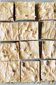 several squares of brownies sitting on top of a table