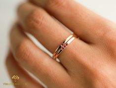 Check out our shop for more items https://www.etsy.com/shop/VimleshBadaya Diamond stacking ring, Gold diamond band, Stackable ring, Stacking diamond ring, Gold diamond ring, Dainty ring, Thin ring for evryday Same design can be made also with other custom gemstones per request. Product details: - approx. 1.5mm Ruby. Ring size - US 3 to US 9 (for smaller or larger ring size, please contact) Please select your size at the drop down menu. Service Available - Customization Available with any other s Ruby Ring Designs, Dainty Gold Band, Ruby Bands, Gold Diamond Band, Diamond Stacking Rings, Jewellery Ideas, Ring Stacking, Gold Ring Stack, Large Ring