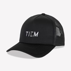 The perfect hat to throw on after a workout. This black trucker hat features a white TIEM logo on the front panel and has an adjustable back. Sports Snapback Hat With Mesh Back And Flat Brim, Flat Brim Snapback Hat With Mesh Back For Sports, Sports Mesh Back Flat Brim Baseball Cap, Sporty Trucker Hat With Mesh Back And Curved Brim, Hip Hop Sports Trucker Hat With Flat Brim, Black Baseball Cap With Mesh Back, Sporty Trucker Hat For Streetwear, Sports 5-panel Baseball Cap With Mesh Back, 5-panel Sports Baseball Cap With Mesh Back