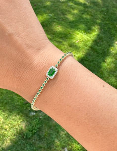 A tennis bracelet is the perfect addition to any outfit. An Emerald tennis bracelet fitted with diamonds and 14K gold can elevate any outfit by adding spiritual power and symbolic beauty.

Add this bracelet to your collection today.

Shop JIA JIA.

#JIAJIAJEWELRY #jewelry #crystals #crystaljewelry #jiajia #emerald #emeraldjewelry #tennisbracelet #diamondtennisbracelet #goldbracelet #bracelet #uniquejewelry #crystalenergy #halotennisbracelet Emerald Tennis Bracelet, Spiritual Power, Tennis Bracelet Diamond, Energy Crystals, Diamond Halo, Tennis Bracelet, Halo Diamond